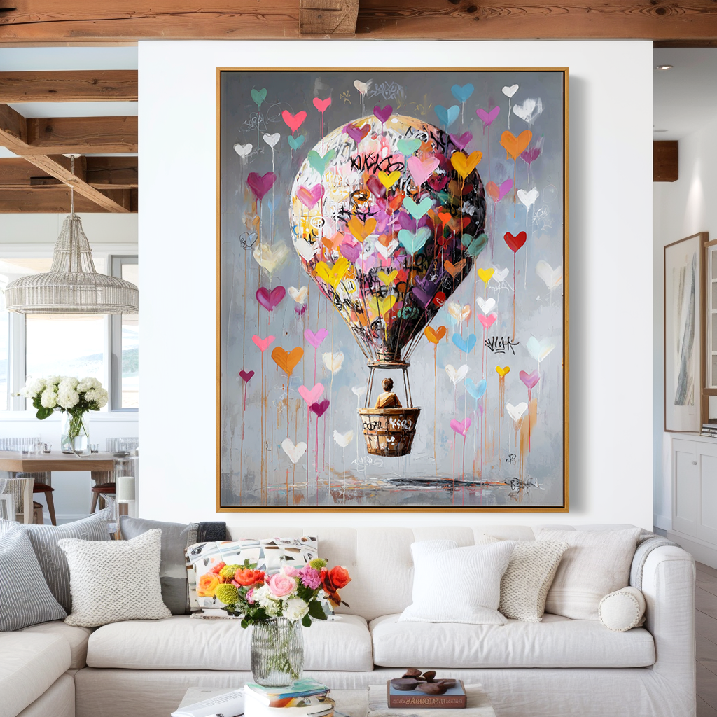 Hot air balloon painting with colorful hearts floating in a gray sky