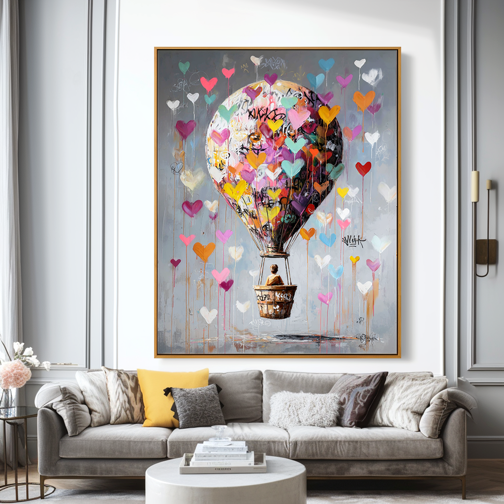 Hot air balloon painting with colorful hearts floating in a gray sky