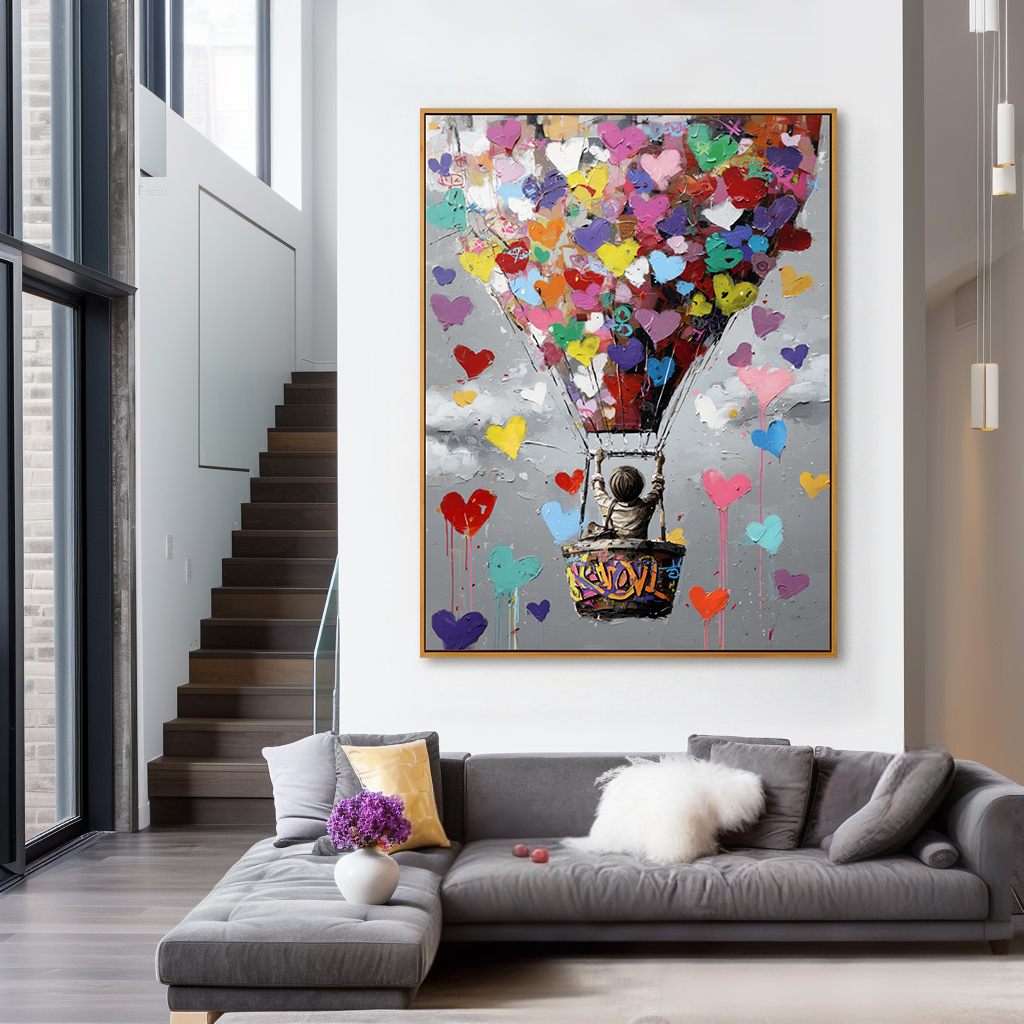 Colorful hot air balloon painting with hearts and a child floating in the sky